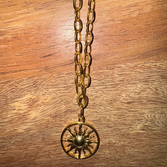 Logan Tay REM necklace. Gold sunburst design. - Picture 2 of 4